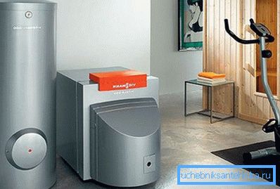 Na fotografii je zobrazený kotol na tuhé palivá s elektrickým a tepelným akumulátorom. Na fotografii je zobrazený kotol na tuhé palivá s elektrickým a tepelným akumulátorom.